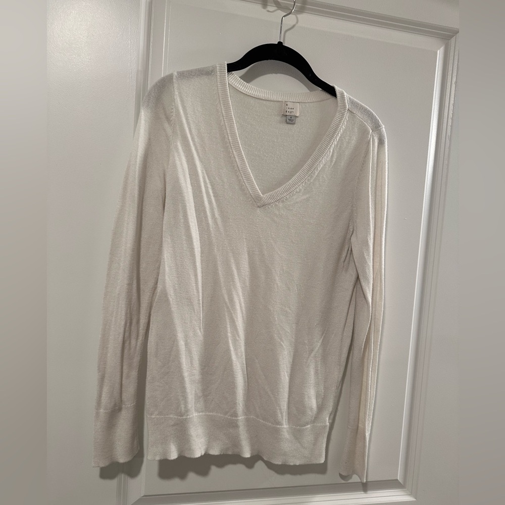 White “a new day” rayon sweater
